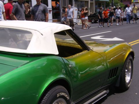 1970 Ford Ranchero - A green and yellow convertible with a white top is seen from the side, Stinger tires and a distinctive grille.