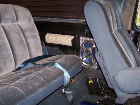 1986 Ford Bronco - Interior view of a vehicle's rear seating area with a visible speaker.