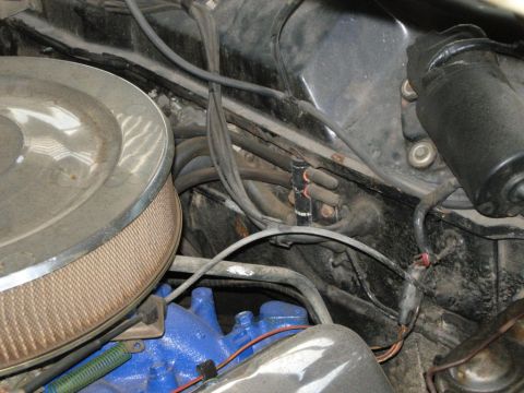 1970 Ford Ranchero - Close-up view of the engine bay, focusing on the air cleaner and various wires and hoses.