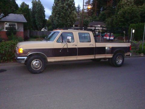 1988 Ford F-350 - This Ford F-350 pickup truck has a two-tone paint scheme and a rack in the bed.