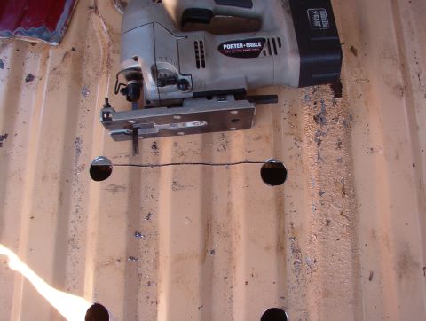 1983 Ford Bronco - The front edge has the most depth clearance for the tank & fuel lines, so I cut it 1st. The lip (visible in the front L hole) juts rearward…