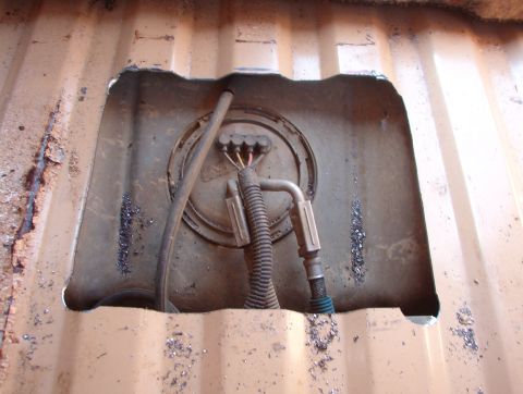 1983 Ford Bronco - If you look closely in the shadow at the top, you'll see that I cut the vapor hose. Fortunately, it's easy to repair. I missed everything e…