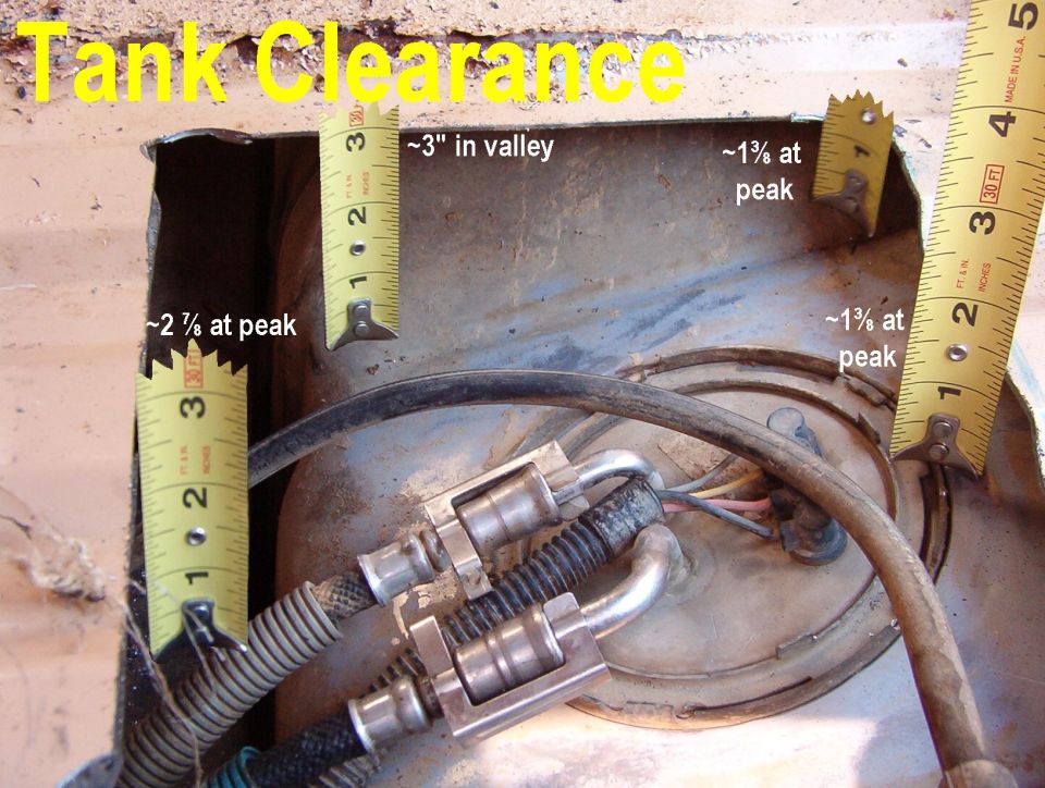 Fuel tank clearance measurements with tape measures showing valley and peak gaps