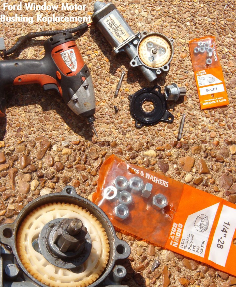 Disassembled Ford window motor parts on gravel with cordless drill