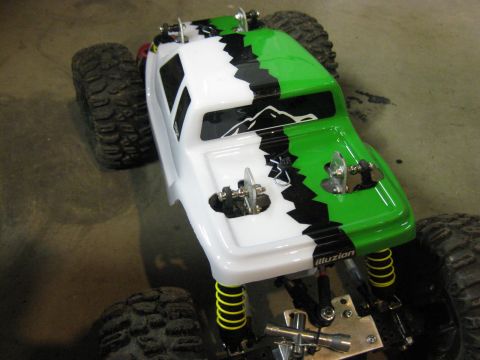 2010 Ford Pickup - This is a remote-controlled rock crawler truck with a distinctive paint job and off-road tires.