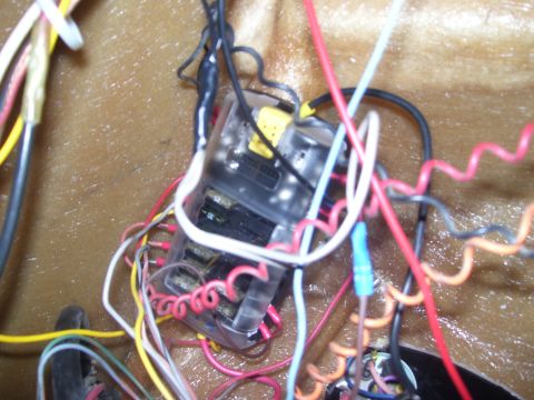 1986 Ford Bronco - Automotive wiring harness and fuse box with numerous connections.