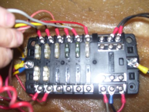 1986 Ford Bronco - Wiring connected to a vehicle's fuse box.