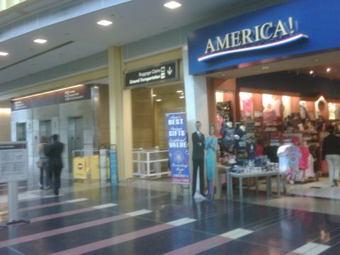 1996 Ford Bronco - Interior view of a store with various merchandise and signage, including 'AMERICA!' above the entrance.
