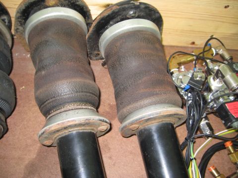1996 Chevrolet Cavalier - Close-up view of air suspension components, including bellows and pneumatic lines.