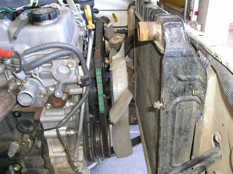 1986 Toyota Hilux - Close-up view of the engine compartment, focusing on the radiator and engine components.