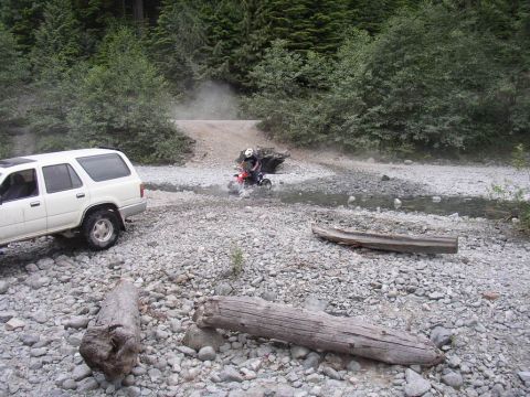1988 Ford Bronco - shane cleaning off the dust