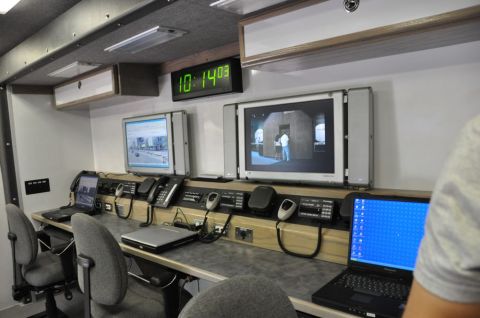 1996 Ford Bronco - Interior view of a mobile command center equipped with communication and monitoring equipment.