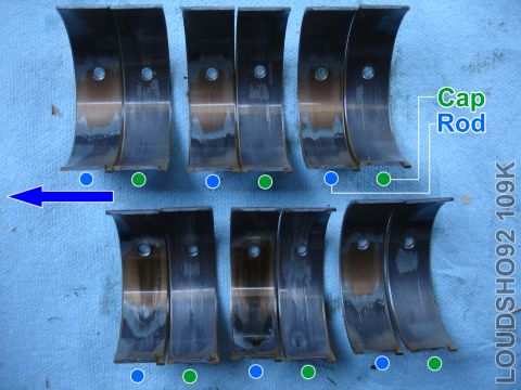 1993 Ford Taurus - Engine rod bearings show signs of wear, with some parts labeled for identification.