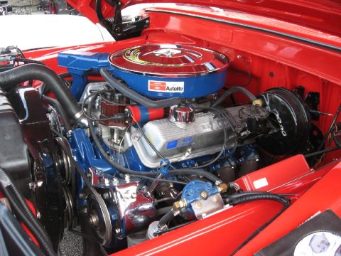1966 Ford F-100 - Close-up of a Ford 428 V8 engine, likely from a 1966 truck.