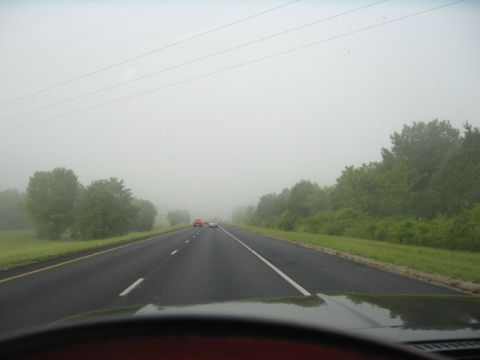 1966 Ford F-100 - Driving on a foggy highway with limited visibility and other vehicles on the road.