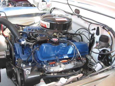 1966 Ford F-100 - Engine bay detail of a Ford V8, possibly from a 1966 truck.