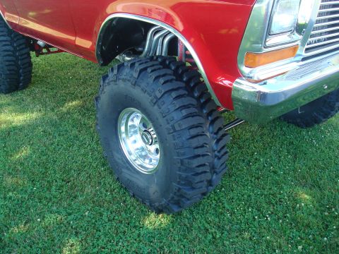 1978 Ford Bronco - This lifted 1978 Ford Bronco features large off-road tires and a prominent chrome grille.
