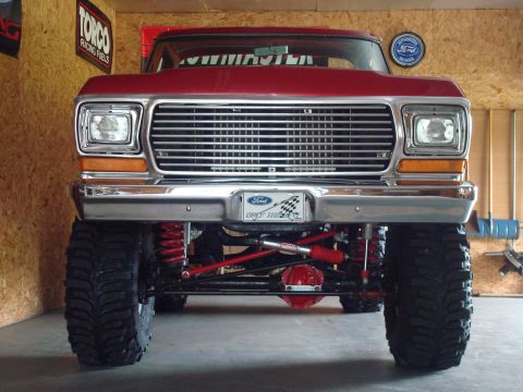 1978 Ford Bronco - Front view of a lifted 1978 Ford Bronco with large off-road tires and custom suspension components.