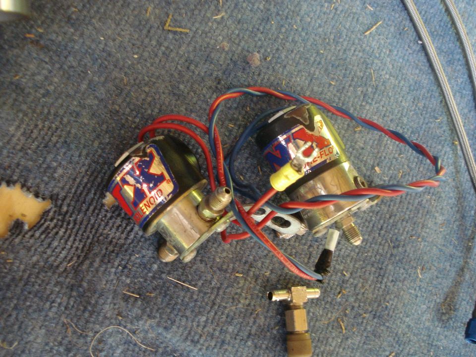 Two solenoids with red and blue wires, one labeled 'SOLENOID' and the other 'ONE-FLO'