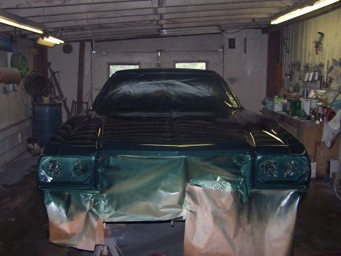 1975 Ford Ranchero - 1975 Ford Ranchero front end masked and ready for paint in a workshop.