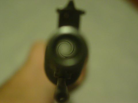 1979 Ford Bronco - Looking down the barrel of an unknown object, possibly a firearm.