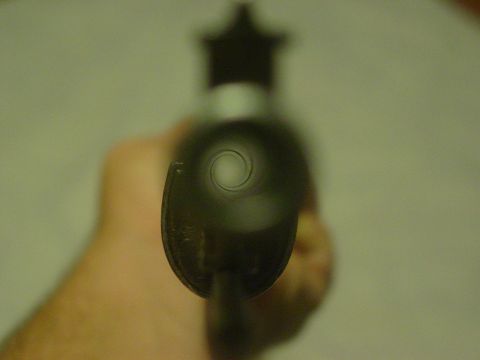 1979 Ford Bronco - A close-up view down the barrel of a gun.