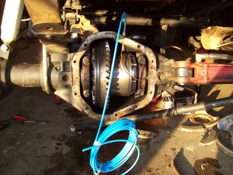 1995 Ford Bronco - Close-up view of an open differential housing, showing internal gears and components.