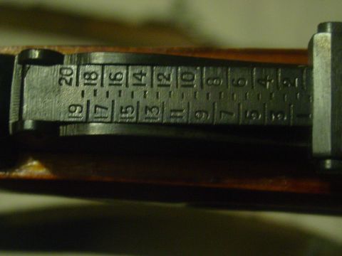 1979 Ford Bronco - Close-up of gun sight markings showing range indicators from 1 to 20.