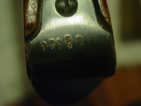 1979 Ford Bronco - Stamped numbers 19139 are visible on a metal part, possibly a firearm component.