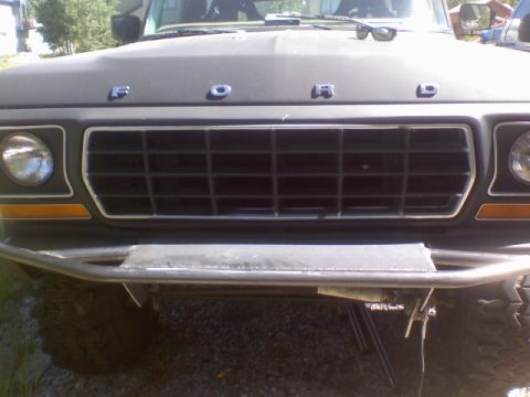 1978 Ford Bronco - Front view of a 1978 Ford Bronco, showing its distinctive grille and hood lettering.