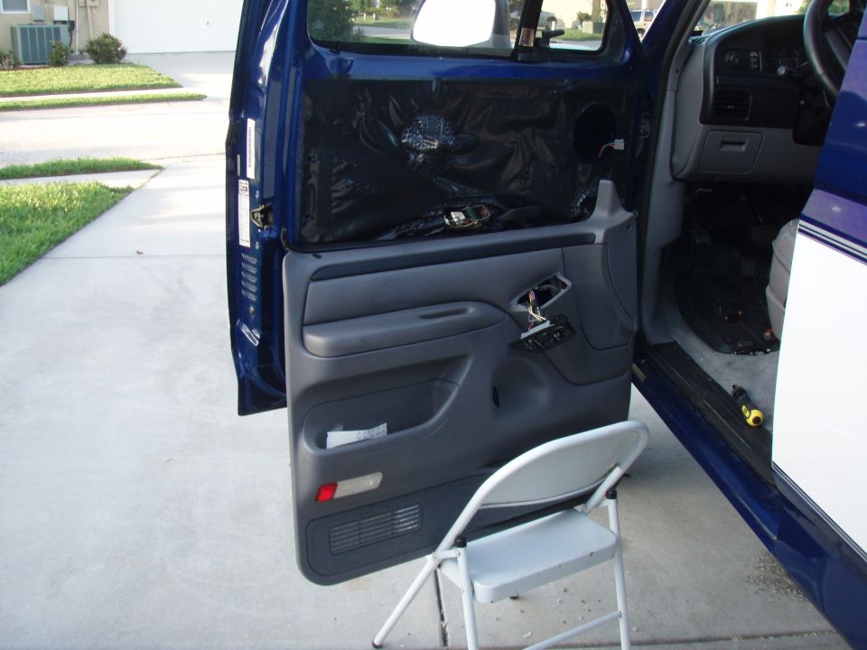 1996 Ford Bronco interior door panel removed, showing insulation