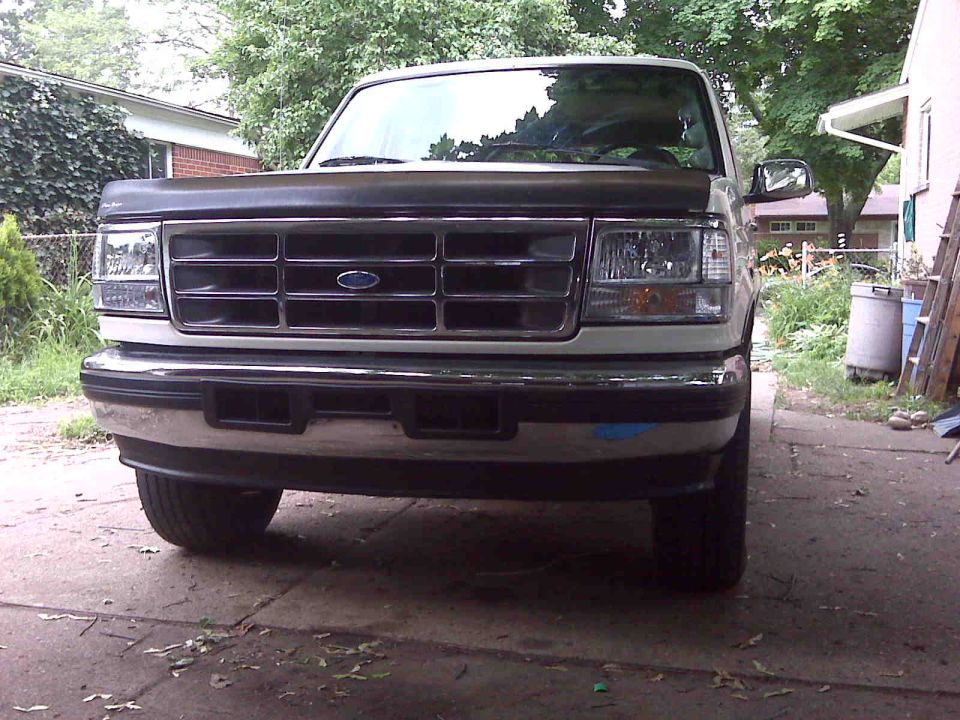 Front view of a 1995 Ford Bronco parked in a driveway