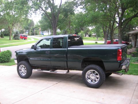 2001 Chevrolet Silverado 1500 - '03 tails, clear lights, 35"s on 20s, nerf bars, and fully de badged!