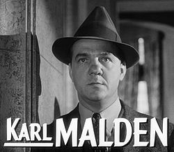 1991 Ford Crown Victoria - Portrait of actor Karl Malden with his name and a website address superimposed on the image.