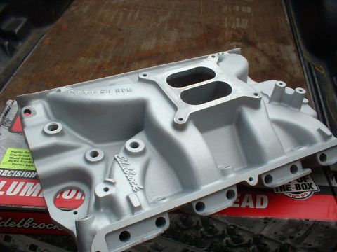 1968 Ford Galaxie - Edelbrock intake manifold, likely for a performance engine build, resting on boxes.