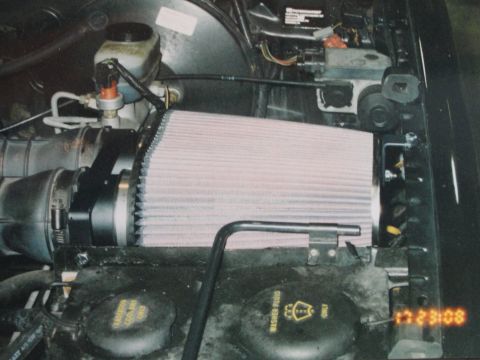 1995 Ford Bronco - The engine bay shows an aftermarket air filter and various fluid reservoirs, with a timestamp of 17:23:08.