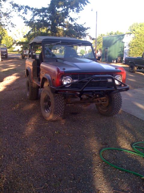 1968 Ford Bronco - This 1968 Ford Bronco features a two-tone paint scheme and an aggressive aftermarket front bumper.