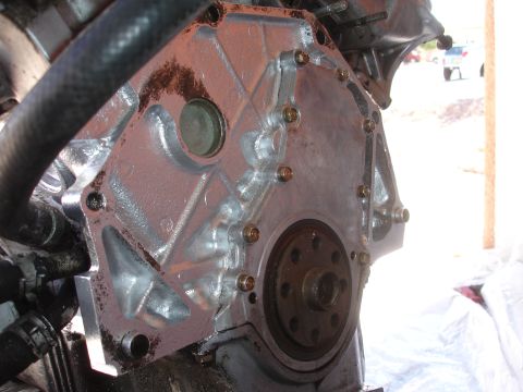 1990 Ford Taurus - Close-up view of an engine block, showing mechanical components and assembly details.