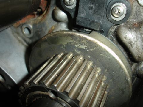 1992 Ford Taurus - Close-up view of a crankshaft pulley and sensor assembly, likely part of an engine rebuild or swap.