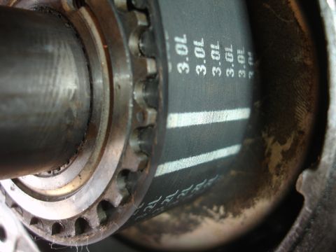 1992 Ford Taurus - A close-up view of a timing belt, showing the '3.0L' designation.
