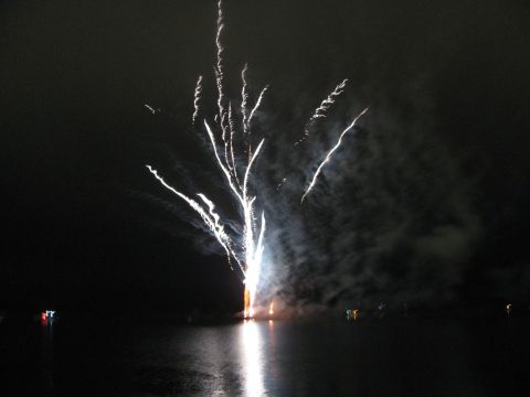 1985 Ford LTD Crown Victoria - Fireworks display over a body of water at night.