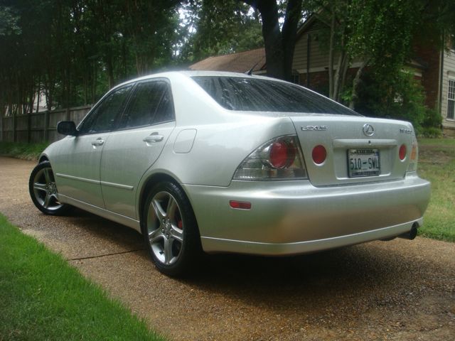 Silver 2001 Lexus IS 300 rear view with custom wheels