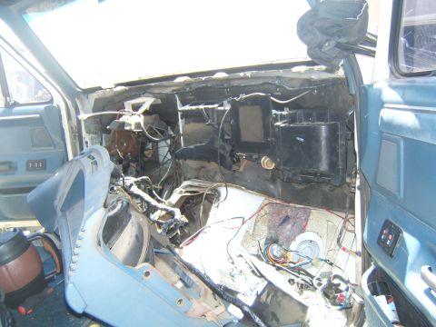 1988 Ford Bronco - Interior view of a 1988 Ford Bronco with the dashboard disassembled for work.