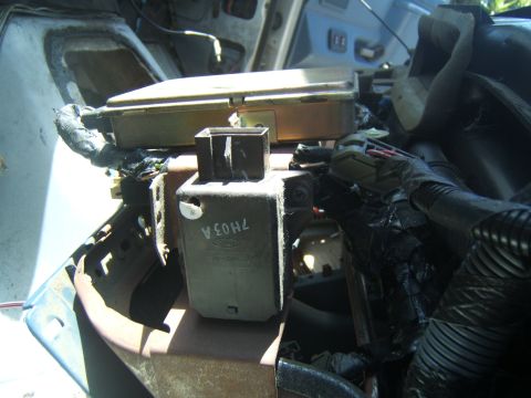 1988 Ford Bronco - Close-up view of the interior electronics and wiring harness, showing a Ford part labeled 7H03A.