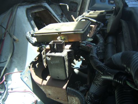 1988 Ford Bronco - Close-up view of automotive electrical components and wiring, likely from a vehicle's interior or engine bay.