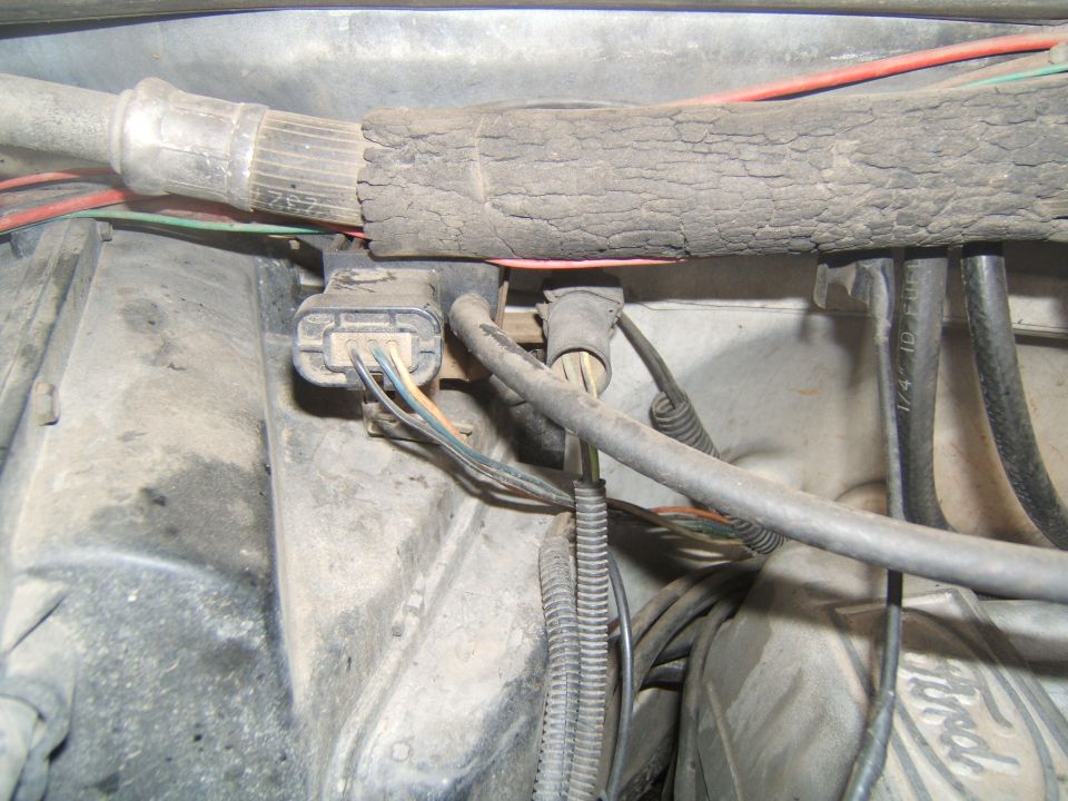 Engine compartment wiring harness with connectors and hoses