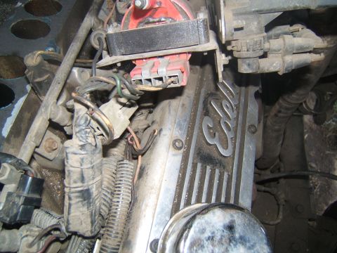 1988 Ford Bronco - The Edelbrock valve cover is visible on this engine, with various wires and engine components in the foreground.