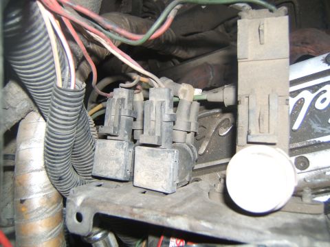 1988 Ford Bronco - Close-up of Ford engine connectors and wiring harness, likely from a 1988 Bronco.