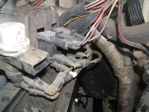1988 Ford Bronco - Engine wiring harness and spark plug wires are visible in this close-up view.