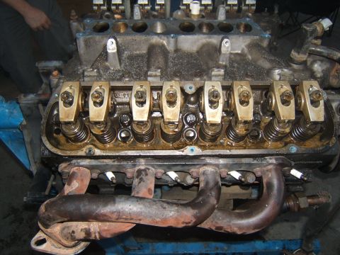 1988 Ford Bronco - Close-up of a Ford V8 engine, showing internal components and exhaust system.